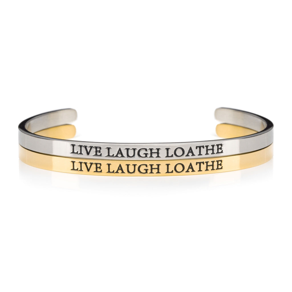 silver and gold open cuff bracelet that say LIVE LAUGH LOATH
