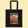 Black cotton tote bag with rainbow graphic and GOOD VIBES on front