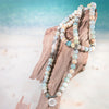 Amazonite Natural Gemstone mala beaded bracelet with silver accents and a silver lotus flower coin pendant