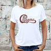 Woman wearing white t-shirt with Chingona in red cursive that looks like the Chicago logo