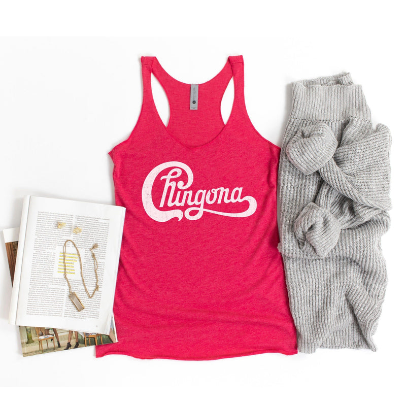 Ladies bright pink top with white distressed Chingona cursive graphic