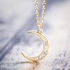 Dainty gold and crystal crescent moon pendant necklace