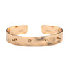Gold hammered cuff bracelet with raised dots