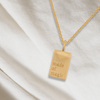High shine gold tag necklace "made of magic"