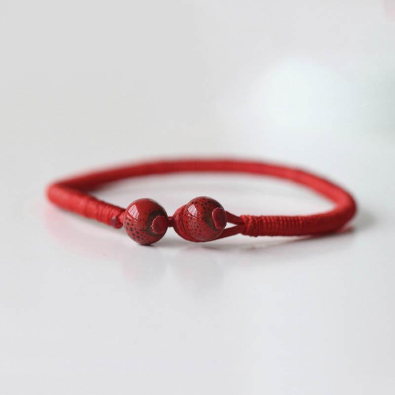 Hatha Red String Bracelet with 2 red ceramic beads for luck and protection
