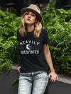 Women in hat wearing black t-shirt with white HEAVILY MEDITATED graphic and a white moon in the center