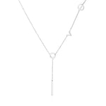 Gold lariat necklace with lowercase latters spelling "love", with the letter "l" hanging down the center