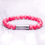 Bright Pink beaded wish bracelet that holds a written wish inside the bracelet clasp