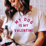 Womens white t-shirt with distressed red block letters on front that say MY DOG IS MY VALENTINE 