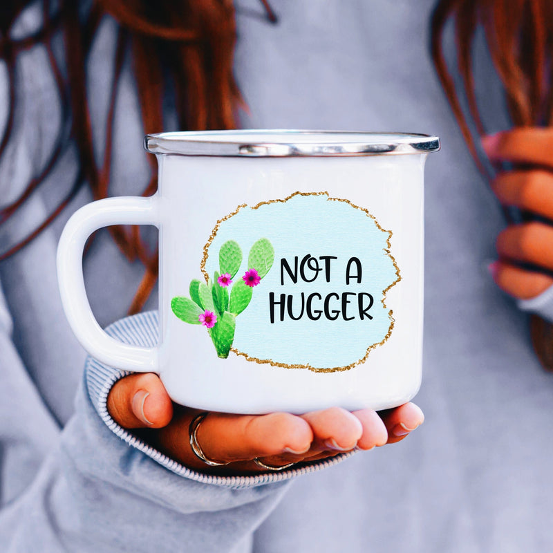 "NOT A HUGGER" funny white camp mug with pretty cactus