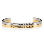 Womens silver and gold open cuff bracelet printed with the words NOT TODAY SATAN in black lettering