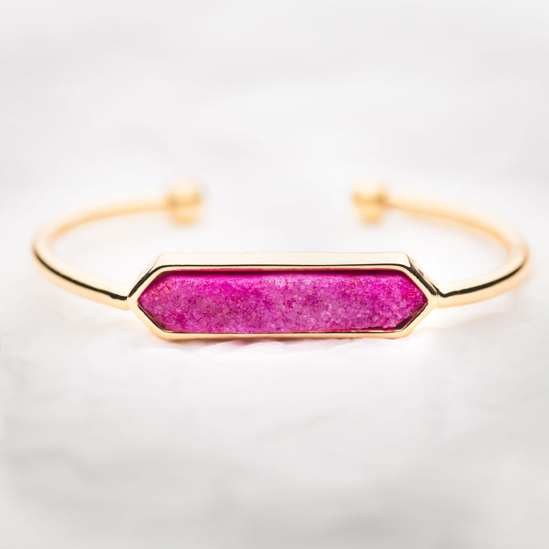 Gold cuff bracelet with hot pink druzy centerpiece