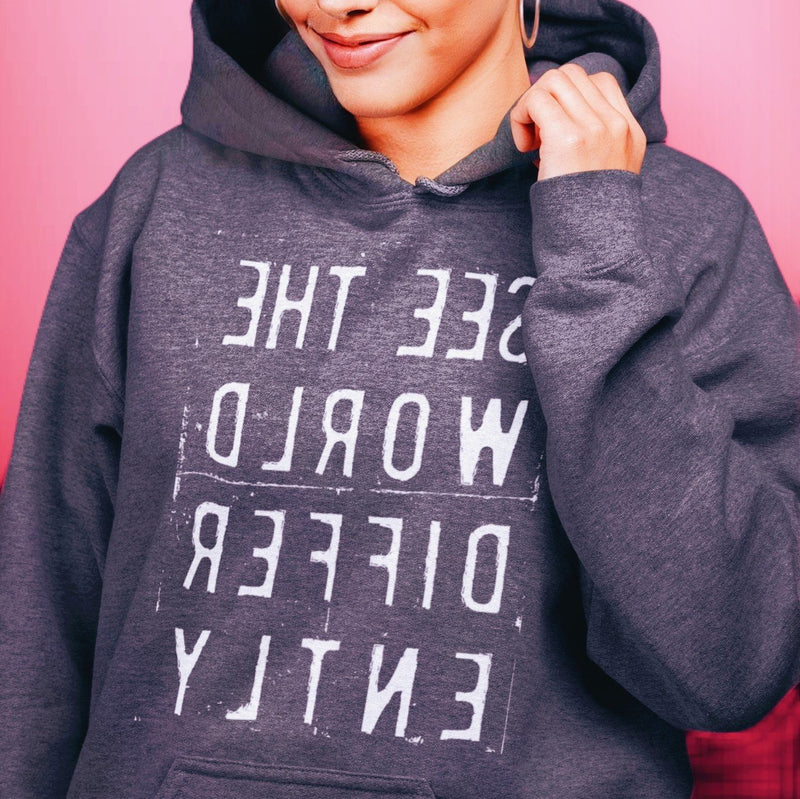 Dark Heather Gray hoodie sweatshirt with reverse white letters that say See The World Differently backwards