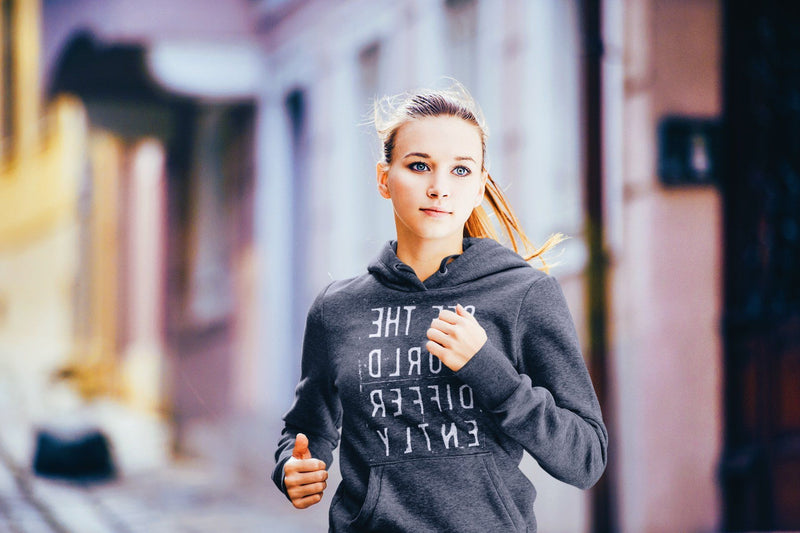 Running dark heather gray  hoodie sweatshirt with reverse white letters that say See The World Differently backwards
