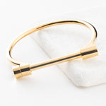 Gold shackle cuff bangle bracelet with screw bar closure