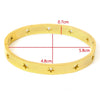 Gold stainless steel bangle bracelet with star cutouts