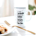 Tall Speckled white mug with the motivational message "THE WORLD NEEDS WHO YOU WERE MADE TO BE"