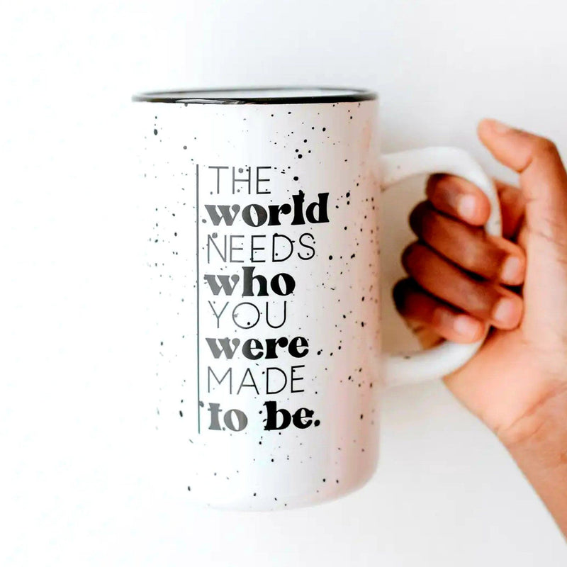 Huge oversized white mug with black speckles and black rim - mug says "the world needs who you were made to be"