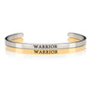 1 silver and 1 gold open cuff mantra bracelet that say WARRIOR