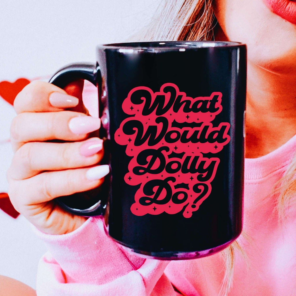 Tall Black mug with bubble red writing that says "What would Dolly Do?"
