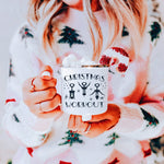 Womens white christmas camp mug with funny picture of wine openers exercising