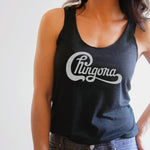 Woman in vintage black tank top with distressed Chingona cursive graphic