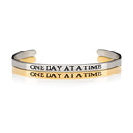 ONE DAY AT A TIME high-shine gold and silver inpirational cuff bracelets for those in recovery